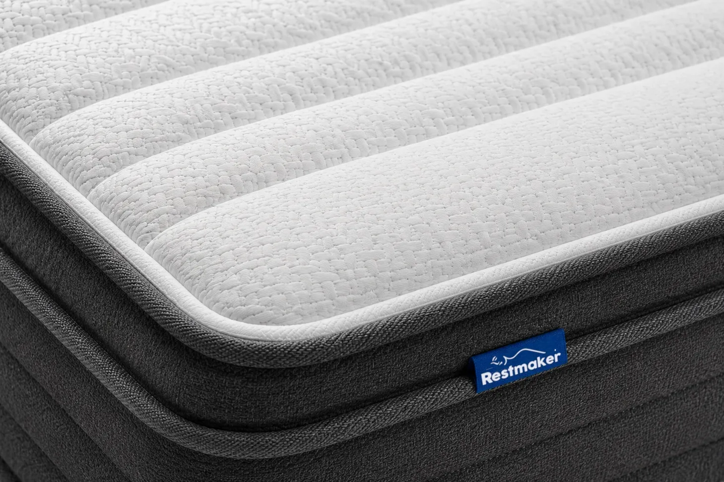 iSLEEP DELUXE mattress in a box compressed roll with scissors nearby